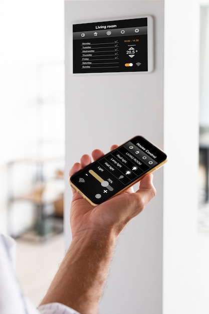 person-using-smartphone-his-automated-home_23-2149036906